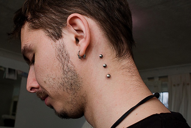 dermal piercings on back. After a Dermal Piercing nape looks red in appearance.